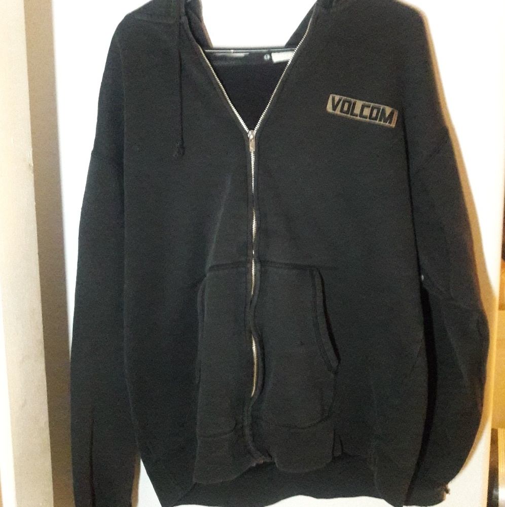 A black/gold colored Volcom Special Forces jacket